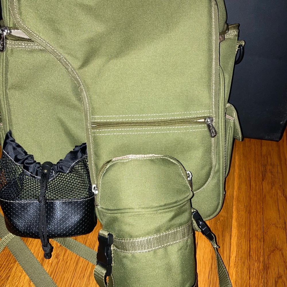 Backpack cooler with water bottle carrier